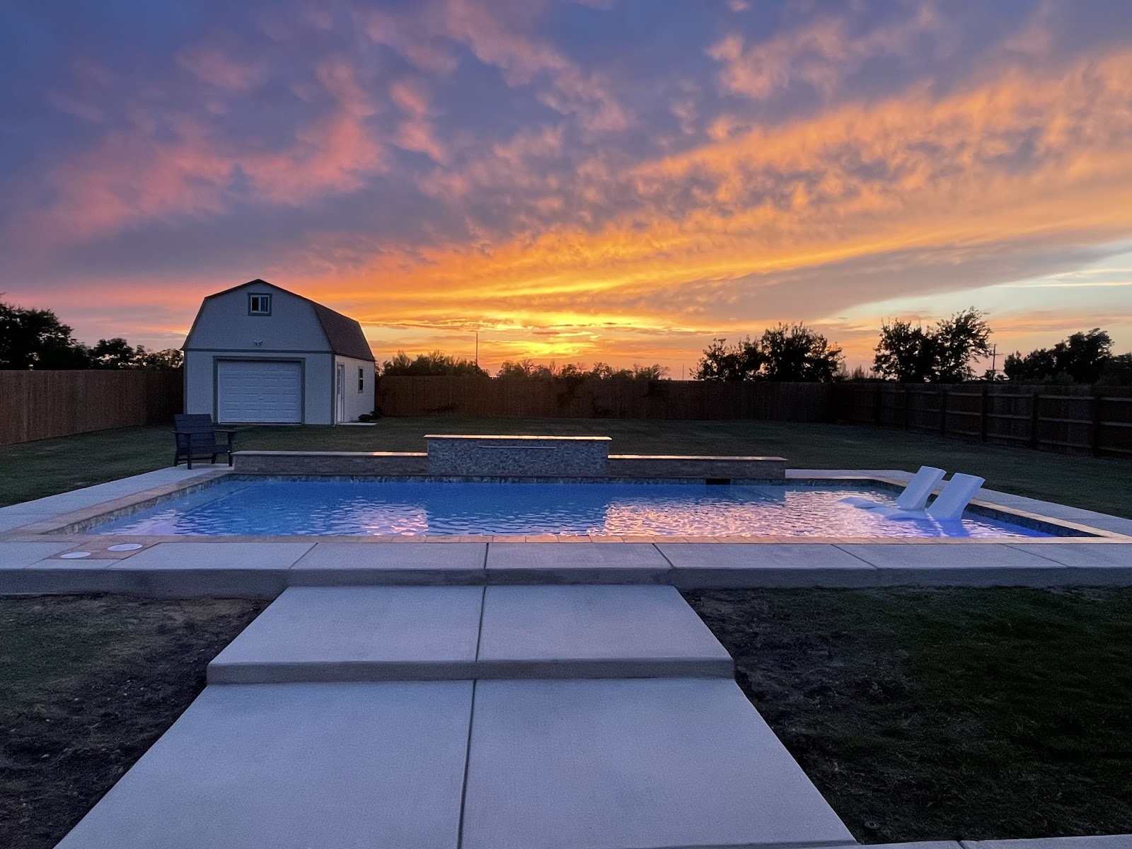 Large Family Pool with Custom Landscaping